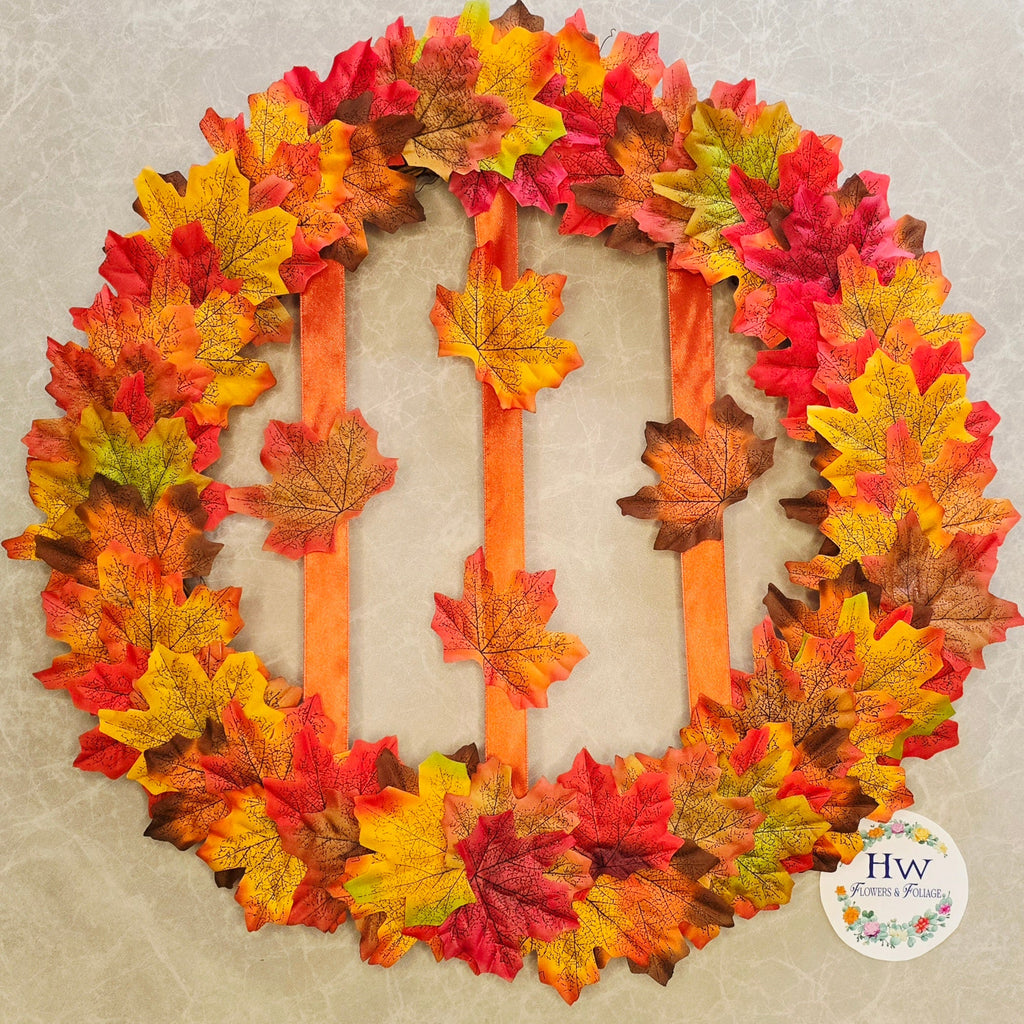 Warmth of Autumn Wreath - full view showing maple leaves and mandarin ribbon