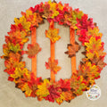 Warmth of Autumn Wreath - full view showing maple leaves and mandarin ribbon