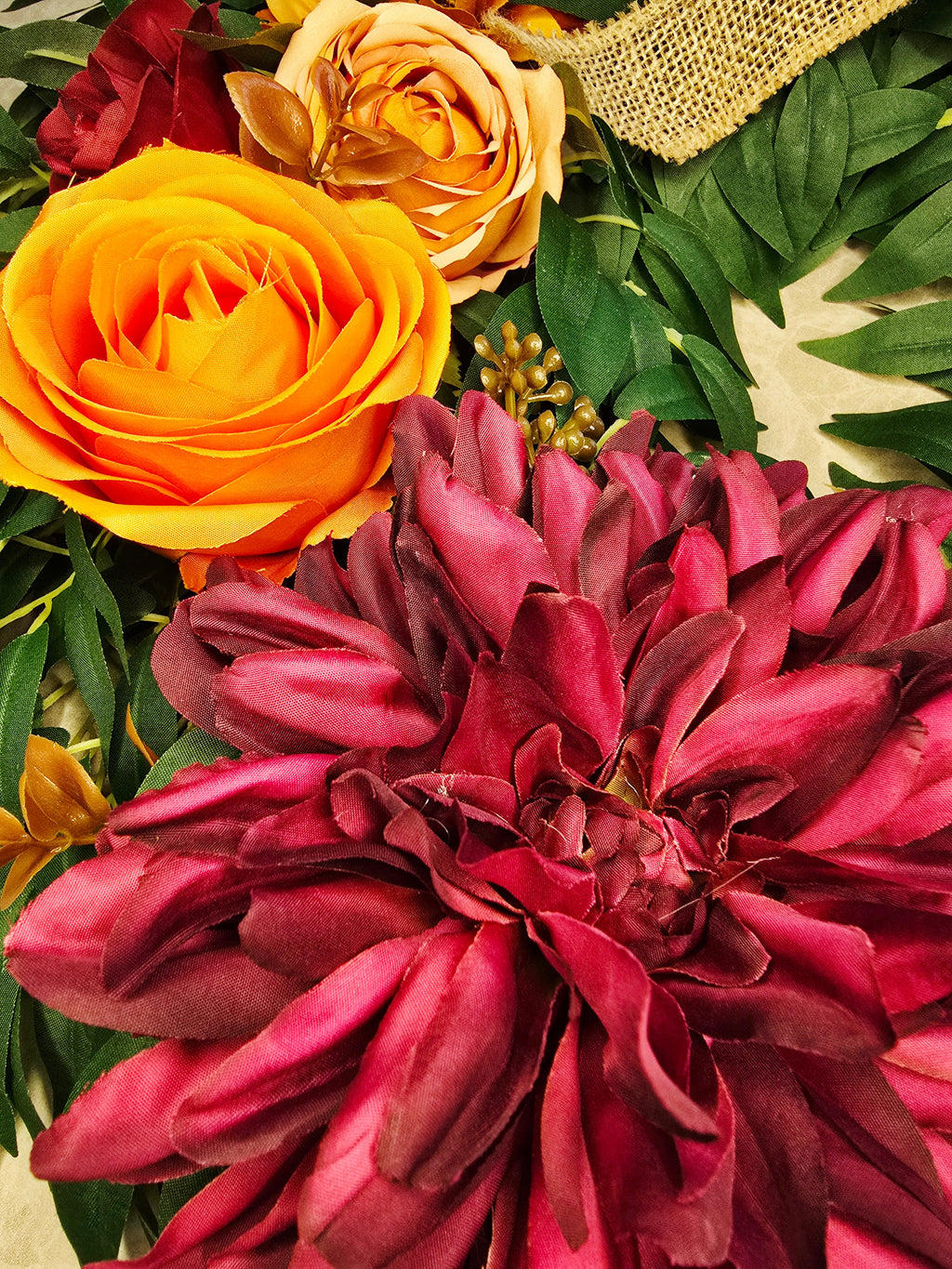 Amber & Mulberry Wreath - close up of orange Harper rose and mulberry dahlia