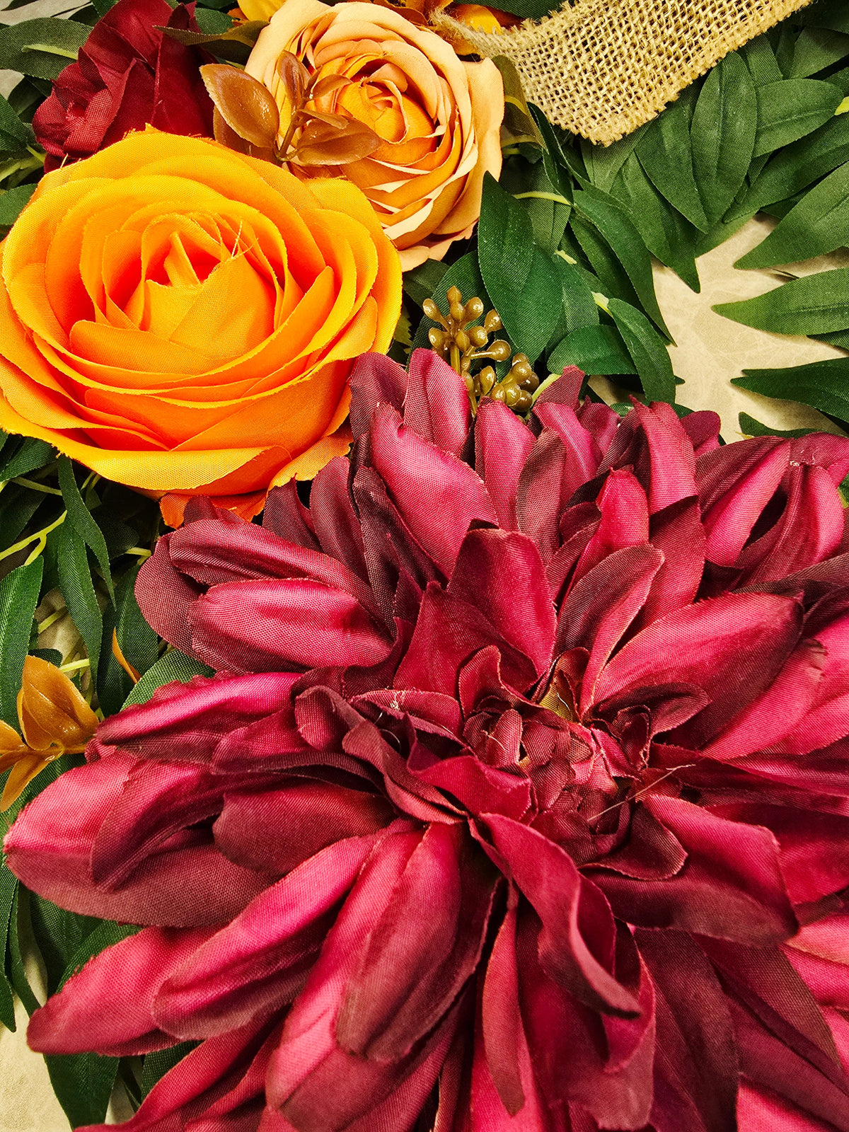 Amber & Mulberry Wreath - close up of orange Harper rose and mulberry dahlia