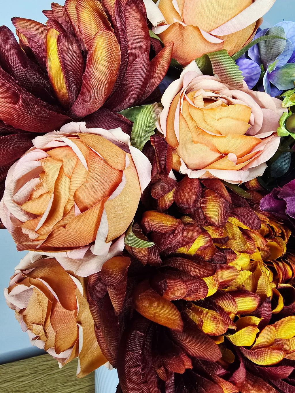 Autumn Nights Bouquet - close up of peach roses and burgundy dahlias