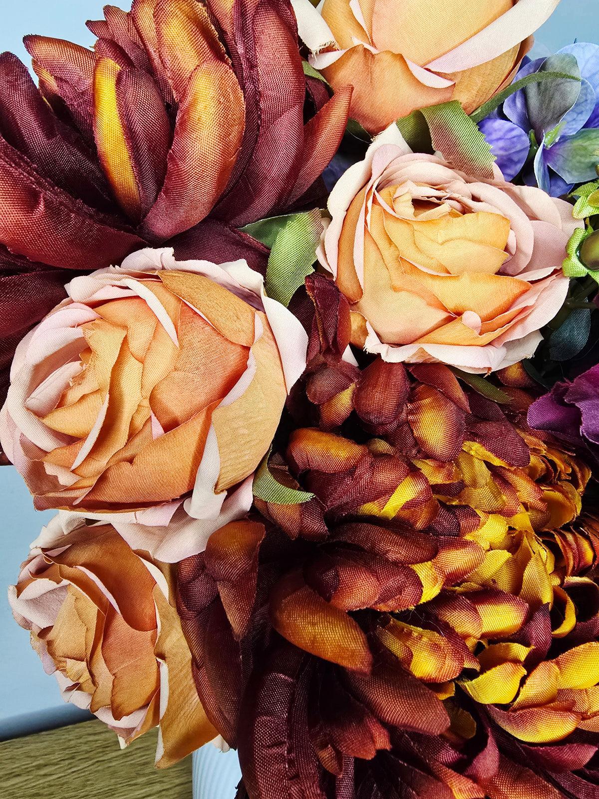 Autumn Nights Bouquet - close up of peach roses and burgundy dahlias