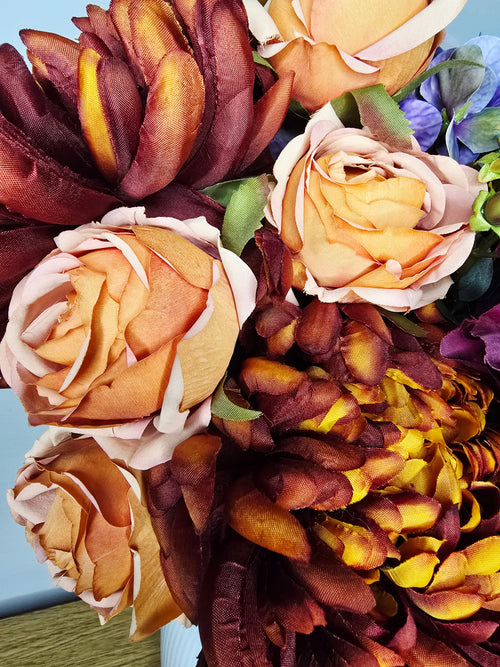 Autumn Nights Bouquet - close up of peach roses and burgundy dahlias